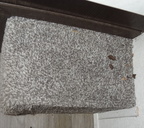 unknown goo on carpet by kitchen cabinet